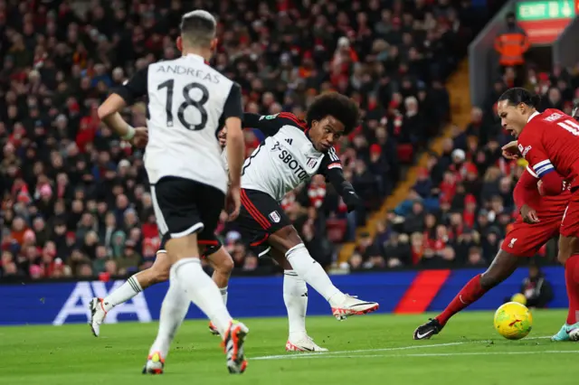 willian scores the first goal against Liverpool in the first leg of the Carabao cup semi-final