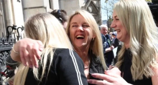 Former post office worker Janet Skinner (centre) outside the Royal Courts of Justice, London, after having her conviction overturned by the Court of Appeal