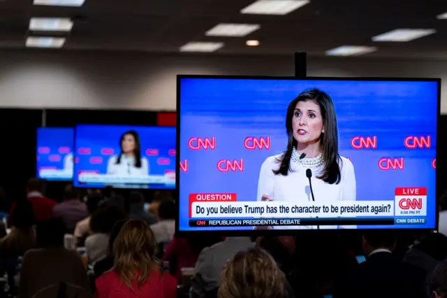 A television monitor in the media filing room at the debate venue displays Nikki Haley