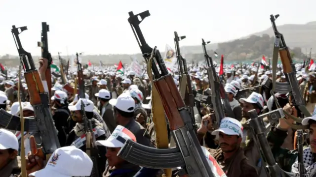 Houthi fighters seen at a rally last month