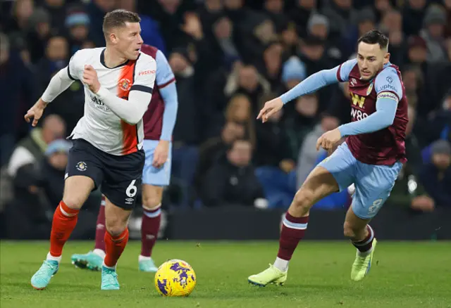 Ross Barkley of Luton Town and Josh Brownhill of Burnley in action