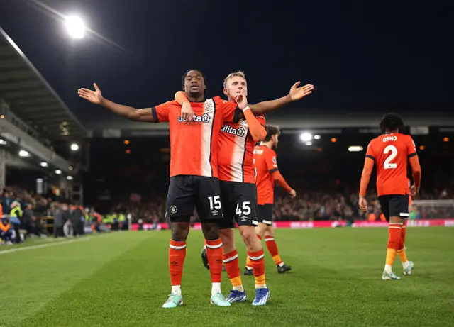 Teden Mengi of Luton Town celebrates with teammate Alfie Doughty after scoring the team's first goal during the Premier League match between Luton Town and Crystal Palace at Kenilworth Road on November 25, 2023 in Luton, England