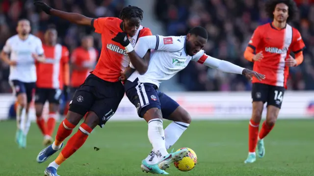 Bolton in action against Luton