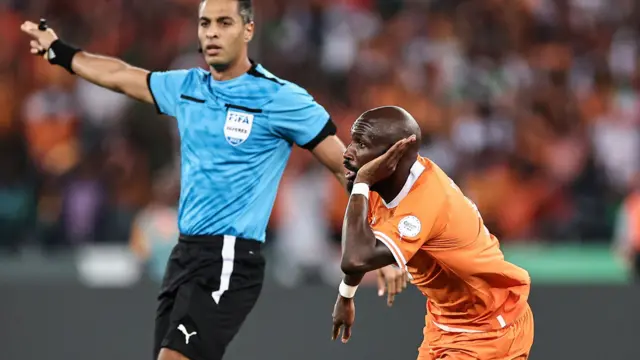 Seko Fofana celebrates his goal against Guinea-Bissau