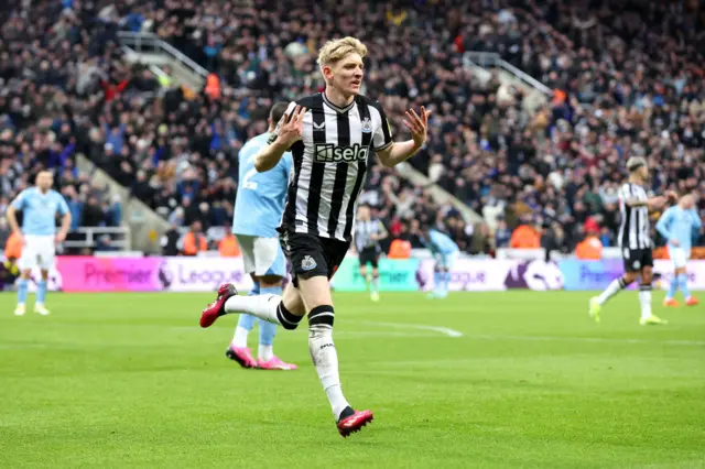 Anthony Gordon celebrating scoring against Man City