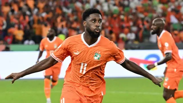 Jean-Philippe Krasso celebrates a goal against Guinea-Bissau