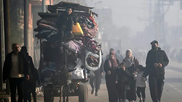 Residents of Al Nusairat and Al Bureij refugee camps begin to evacuate following an Israeli warning