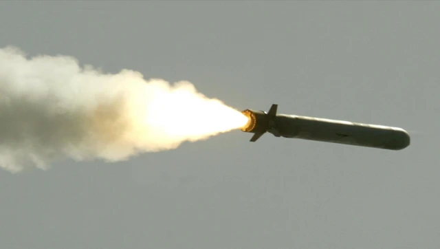 Tomahawk missile flies toward Iraq after being launched from the AEGIS guided missile cruiser USS San Jacinto March 25, 2003 in the Red Sea