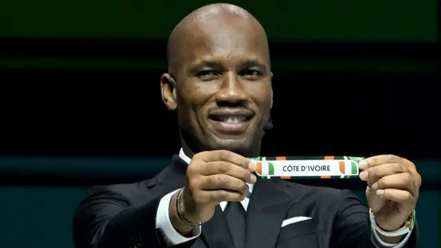 A photo of Didier Drogba taking part in the Afcon 2023 draw