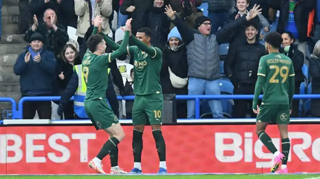 Morgan Whittaker celebrates giving Plymouth the lead at Huddersfield