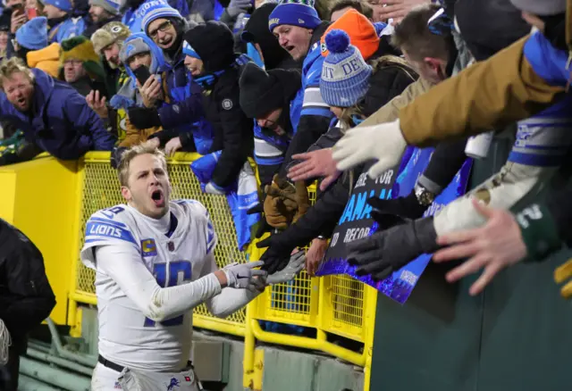 Jared Goff celebrates with Detroit Lions fans