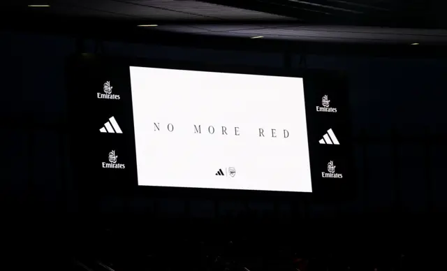 The Emirates scoreboard shows the 'No More Red' slogan.