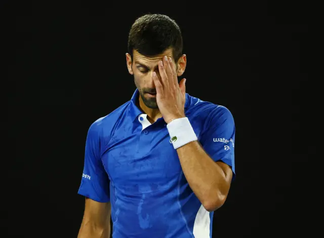 Novak Djokovic reacts in disappointment