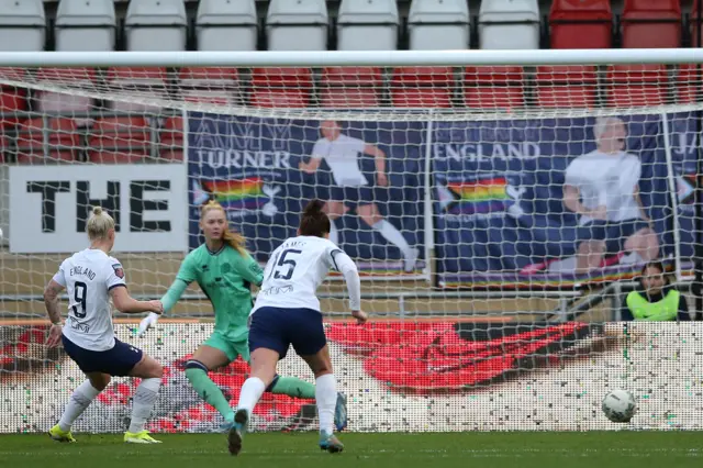 Tottenham captain Beth England making it 2-2 from the penalty spot