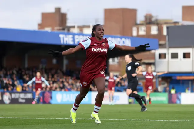 Viviane Asseyi celebrates scoring for West Ham against Chelsea