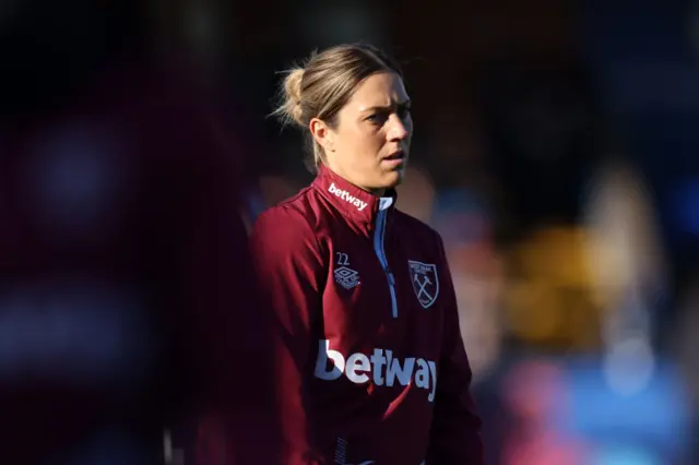 Katrina Gorry pauses to listen to instructions in the West Ham warm up.