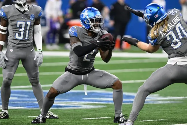 CJ Gardner-Johnson and Alex Anzalone celebrate