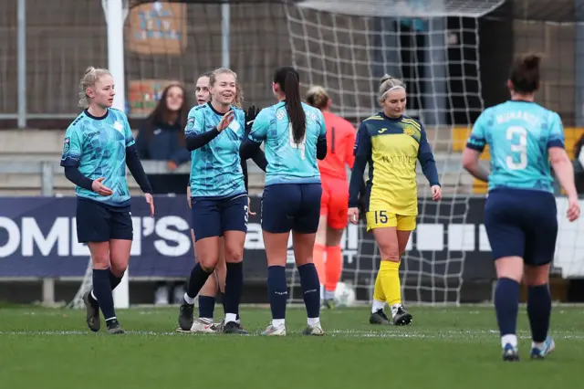 Ruesha Littlejohn of London City Lionesses celebrates with teammate Georgia Brougham of London City Lionesses after scoring their team's first goal during the Adobe Women's FA Cup Fourth Round match against Moneyfields