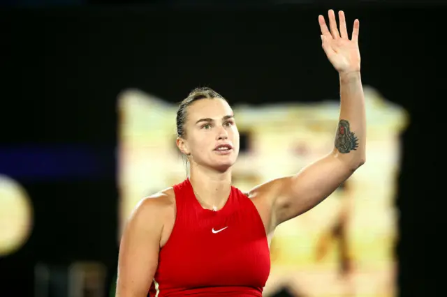 Aryna Sabalenka waves to the crowd