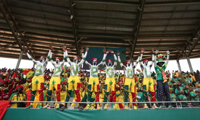 Fans spell out Senegal with body paint during the TotalEnergies CAF Africa Cup of Nations group stage match between Senegal and Gambia