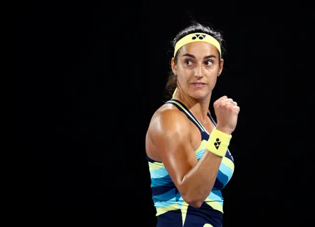 Caroline Garcia pumps her fist in celebration