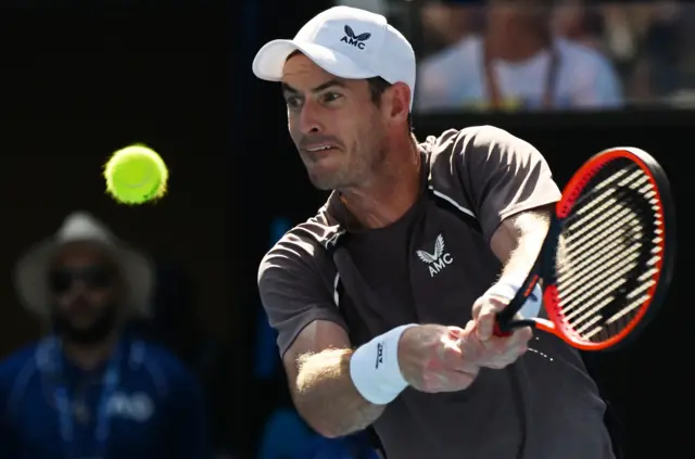 Andy Murray hits a backhand