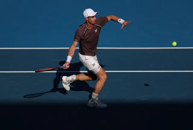 Andy Murray hits a forehand