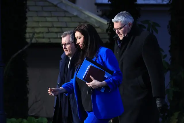 Sir Jeffrey Donaldson, Emma Little-Pengelly and Gavin Robinson walking to talks