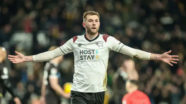 Derby County's Tom Barkhuizen celebrates scoring against Burton