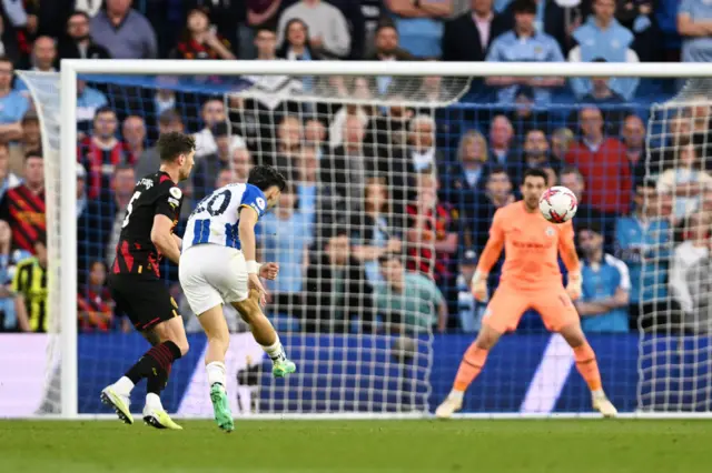 Julio Enciso scores against Man City