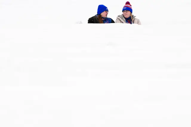 Fans sat in snow covered seats before Bills v Steelers