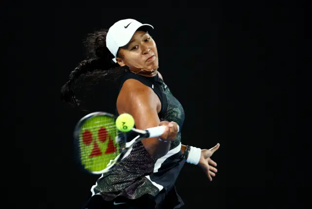 Naomi Osaka hits a forehand shot