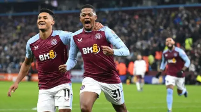 Ollie Watkins and Leon Bailey celebrate