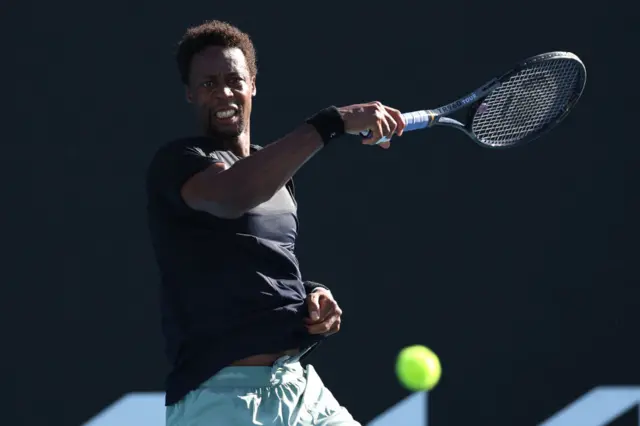 Gael Monfils hits a forehand shot