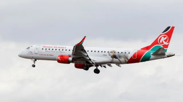 Kenya Airways passenger Embraer 190 plane manoeuvres at the Kenya Defence Forces (KDF) Museum Air Show Festival in conjunction with the Aero Club at the Uhuru Gardens in Nairobi, Kenya, May 28, 2022