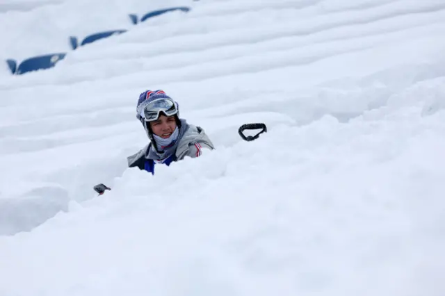 Fans shovelling the snow at Buffalo's Highmarl Stadium