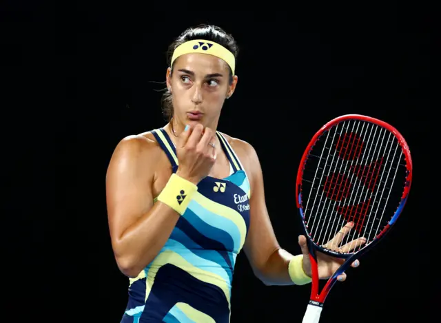 Caroline Garcia blows her fingers