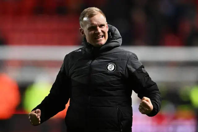 Bristol City boss Liam Manning celebrating