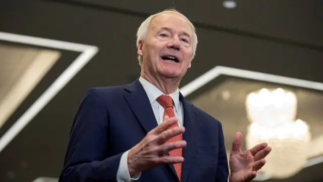 Former Arkansas governor and 2024 Presidential candidate Asa Hutchinson speaks to media following the Republican Party of Iowa legislative breakfast at the Hilton Des Moines Downtown, in Des Moines, Iowa, U.S. January 8, 2024.