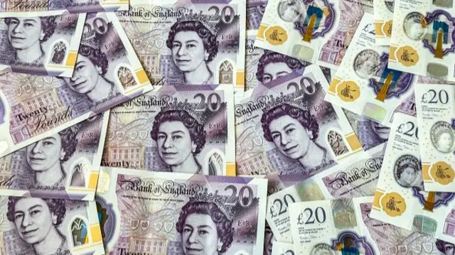 £20 notes featuring the late Queen Elizabeth II are pictured