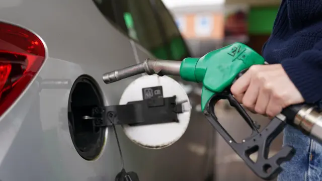 Man filling his car with petrol