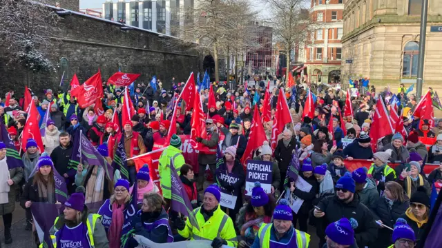 Thousands of striking public sector workers have arrived in Londonderry's Guildhall Square