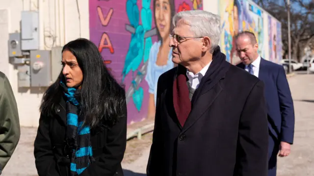 Attorney General Merrick Garland and Associate Attorney General Vanita Gupta take part in a tour of murals of the Uvalde shooting victims, in Uvalde, Texas, U.S., January 17, 2024. The Justice Department is planning this week to release findings of an investigation into the 2022 school shooting.