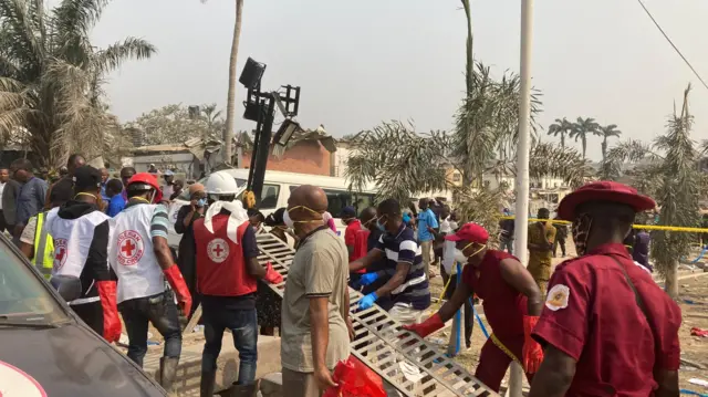 Rescue workers at the scene of the Ibadan blast in Nigeria - 18 January 2024