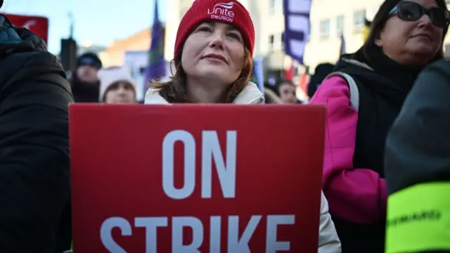 Worker outside city hall