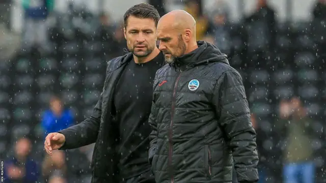 Russell Martin (left) and Luke Williams (right) during his time as Swansea manager