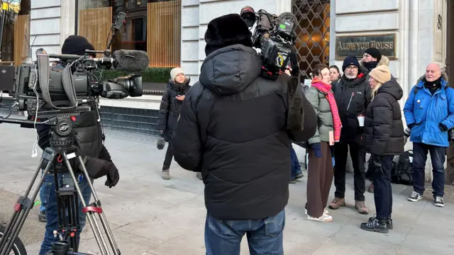 Photographers and cameramen outside Aldwych House, central London, where the Post Office inquiry's taking place