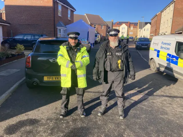 Officers standing on the cordon