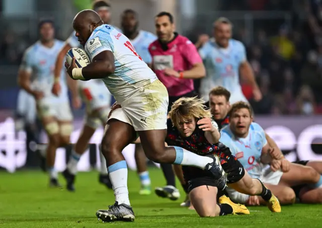 Khutha Mchunu goes in for a Bulls try despite the tackle from Bristol's Dan Thomas