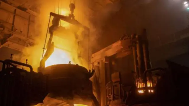 an electric arc furnace at a steel mill in Russia